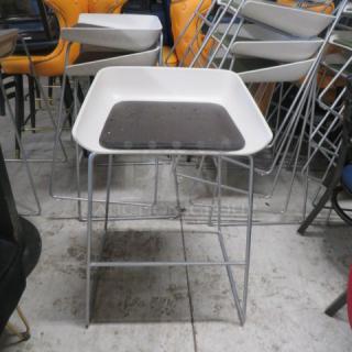 Metal Stool With A Brown Cushioned Seat. 2XBID - Item #1219303