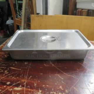 Full size 4-inch deep hotel pan with lid, stainless steel, good condition, suitable for professional kitchen use.