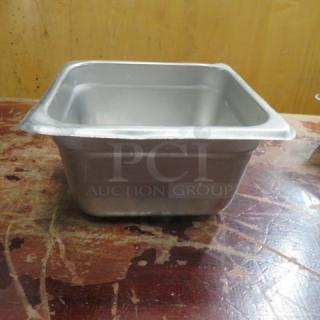 1/6 size 4-inch deep stainless steel hotel pan, gently used, ideal for food service or catering. Model 5XBID.