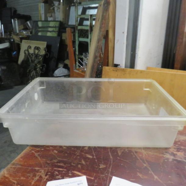 Clear 8.75-gallon rectangular food storage container, used condition, translucent plastic with minor scuffs, no visible labels.