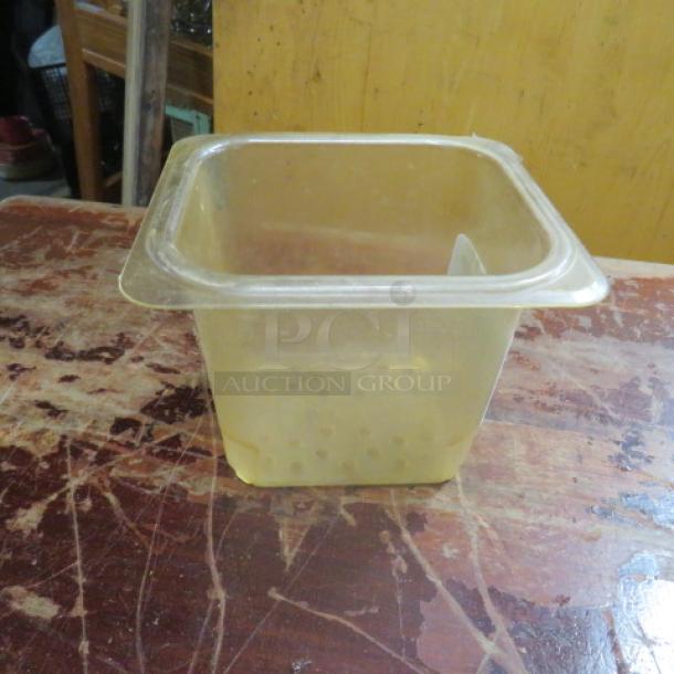 One 1/6 size, 6-inch deep perforated food storage container, transparent plastic, fair condition, stackable design.