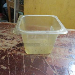 One 1/6 size, 6-inch deep perforated food storage container, transparent plastic, fair condition, stackable design.