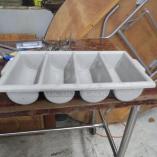 White plastic flatware holder with five compartments, good condition, suitable for organizing utensils.