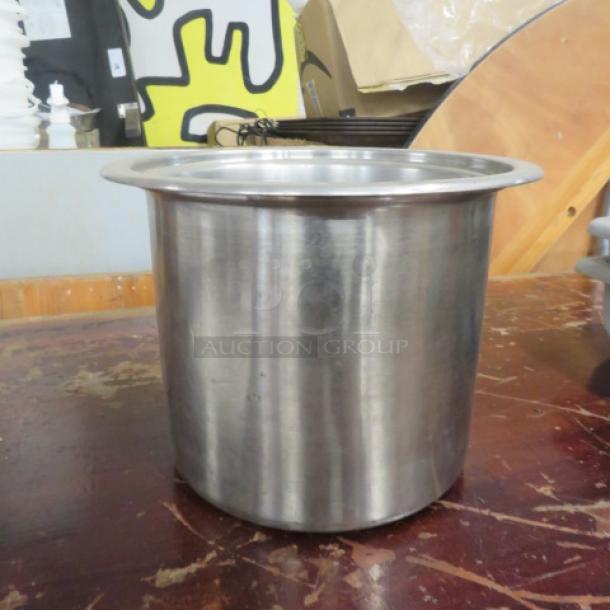 Stainless steel Bain Marie, polished finish, excellent condition, round shape, suitable for food service or catering use.
