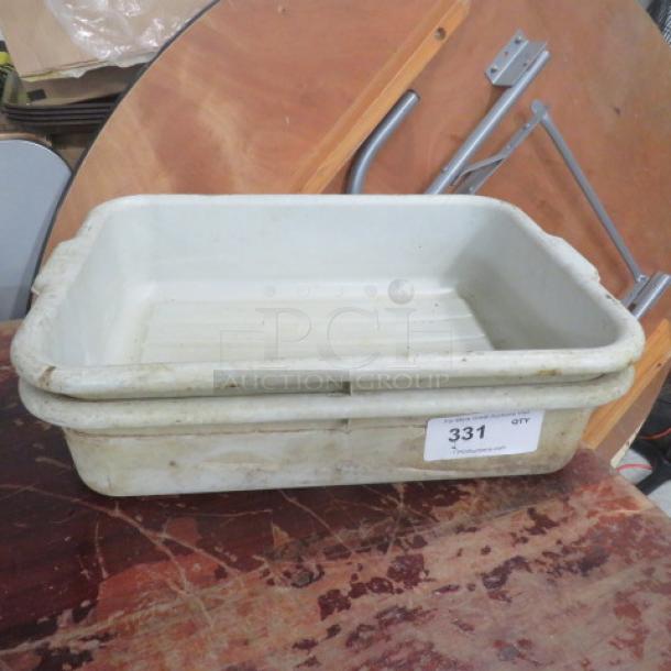 Large, rectangular white bussing tub, model 2XBID, with visible signs of wear. Marked with sticker number 331.