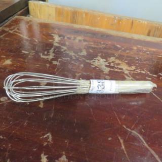 Stainless steel wire whisk, wrapped handle, new condition, packaged with label, ideal for cooking and baking.