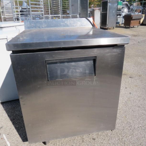 True TWT-27F worktop freezer on casters, stainless steel, measures 27.5x30x40 inches, 115V, single door, excellent condition.