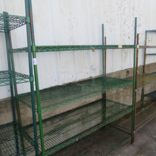 Green Metro shelf with 4 wire shelves, measuring 60x18x75 inches. Used condition, sturdy, ideal for storage.