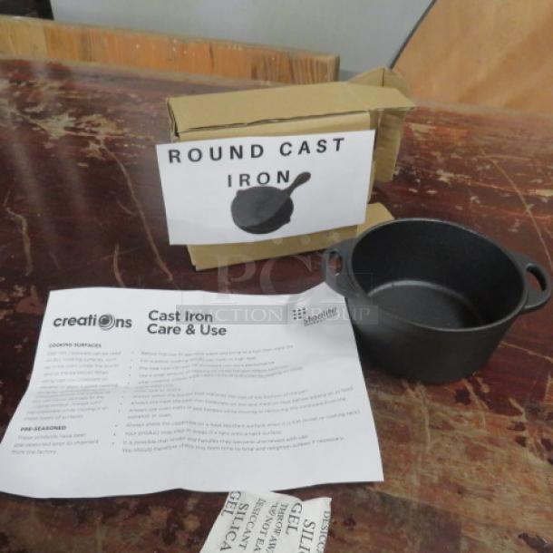 NEW Steelite Cast Iron 13.25oz Baking Dish, model 7361MW201, with care instructions, in original packaging.