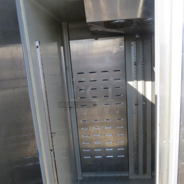 Hoshizaki CF2B-FS stainless steel 2-door freezer on casters, 115V, 54x34x79.5 inches, interior view, excellent condition.