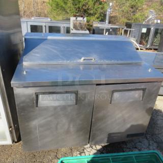 One WORKING True 2 Door Refrigerated Prep Table With 1 Rack On Casters. 115 Volt. Model# TSSU-48-12. 48X30X42.5. $4255.88. - Item #1221823