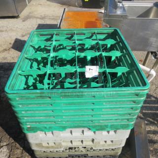 Green plastic dishwasher rack, stackable design, used condition. Number label visible on the side. Suitable for commercial use.