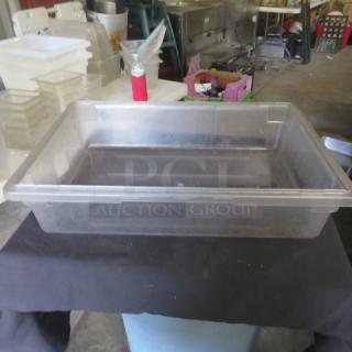 Cambro clear plastic 9-gallon food storage container, rectangular, transparent, used condition, no visible markings.