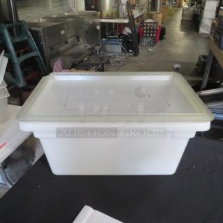 Cambro 4.75-gallon food storage container with lid, durable plastic, in good condition, ideal for commercial kitchen use.