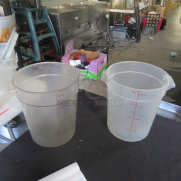 Cambro 4 Quart Round Food Storage Container, clear with red measurement markings, used condition, two units shown.