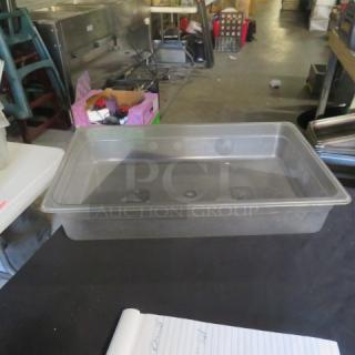 Clear Cambro full-size food storage container, 4 inches deep, in good condition, ideal for commercial kitchen use.