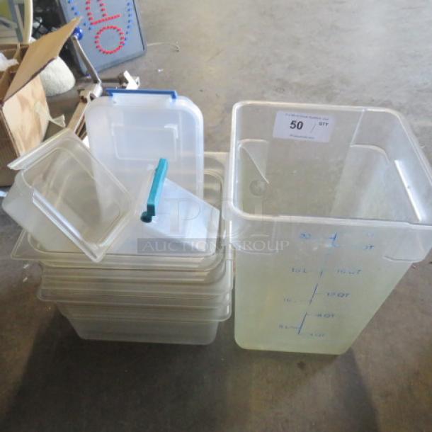 One lot of assorted plastic storage containers with lids, varying sizes, translucent with measurement markings, used condition.