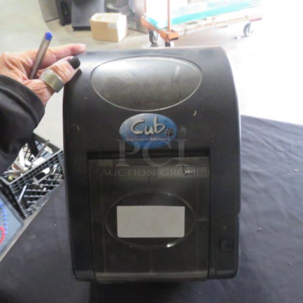 Cub Printer Model CB-534E in used condition with visible branding. Features compact design, ideal for small spaces.