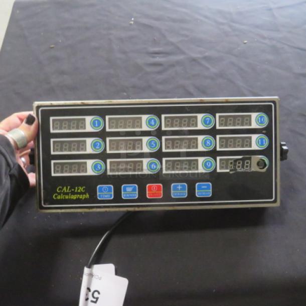 Calculagraph CAL-12C multi-channel timer, with digital display, black casing. Model tag indicates CAL-12C. Visible power cord.