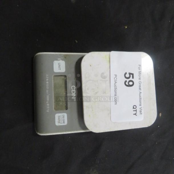 CDN Kitchen Scale Model SD0202 with digital display. Exhibits slight wear. Auction tag number 59 visible.