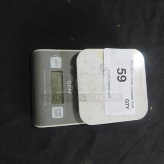 CDN Kitchen Scale Model SD0202 with digital display. Exhibits slight wear. Auction tag number 59 visible.