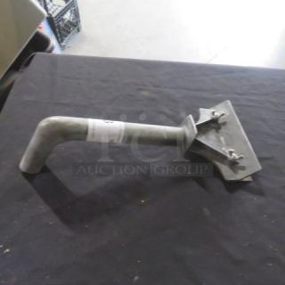 Griddle scraper with metal handle and angled blade, light wear, paper label indicating item number.