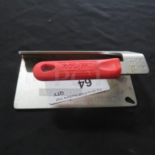 Red-handled Winco steak weight, 2 lbs, in used condition, with label indicating auction item 64.