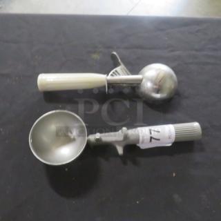 Two assorted dishers with stainless steel scoops and plastic handles, item tagged "77".