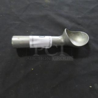 Stainless steel ice cream scoop with cylindrical handle, intact condition, featuring a small tag wrapped around the handle.