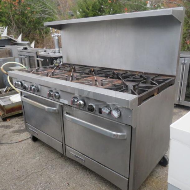 Southbend 10 burner natural gas range with stainless steel overshelf, 4 racks, on casters. Dimensions: 60.5x34x60.