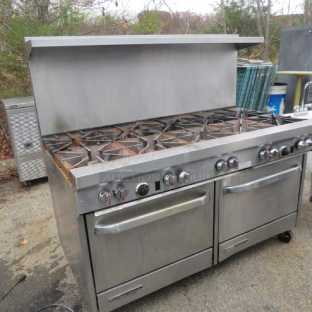 Southbend 10 burner natural gas range with 4 racks, stainless steel over shelf, on casters, dimensions 60.5"x34"x60".