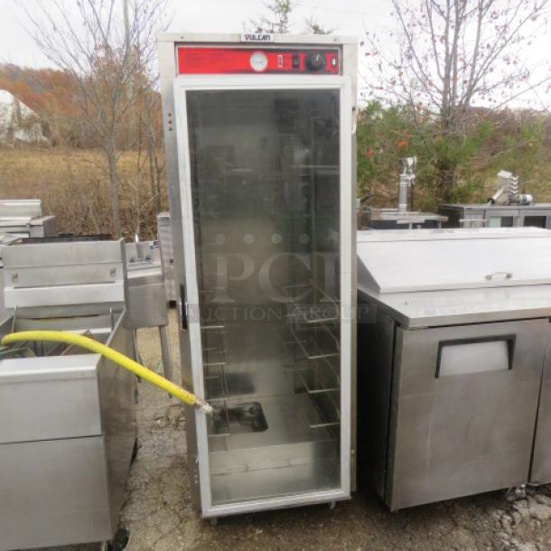 Vulcan Heat and Hold cabinet on casters, 25x30x71, stainless steel, glass door, visible control panel, used condition.