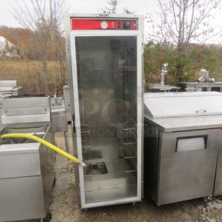 Vulcan Heat and Hold cabinet on casters, 25x30x71, stainless steel, glass door, visible control panel, used condition.