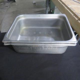 1/2 size 4-inch deep hotel pan, stainless steel, used condition, minor visible stains, stackable design, no visible markings.