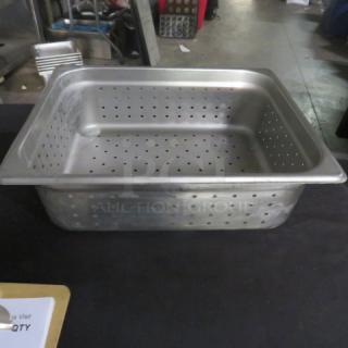 1/2 Size 4" Deep Perforated Hotel Pan, stainless steel, used, with visible perforations for drainage and steam cooking.