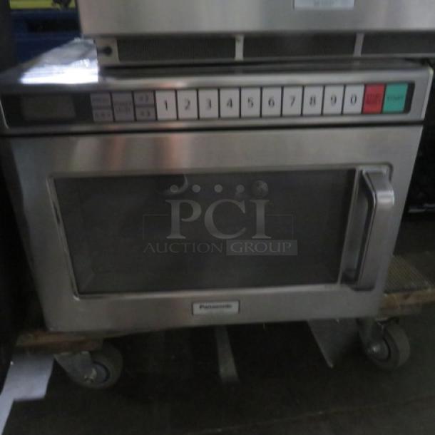 Panasonic Commercial Microwave NE-12521, 120 Volt, stainless steel, keypad control, 16.5x21x12 inches, good condition.