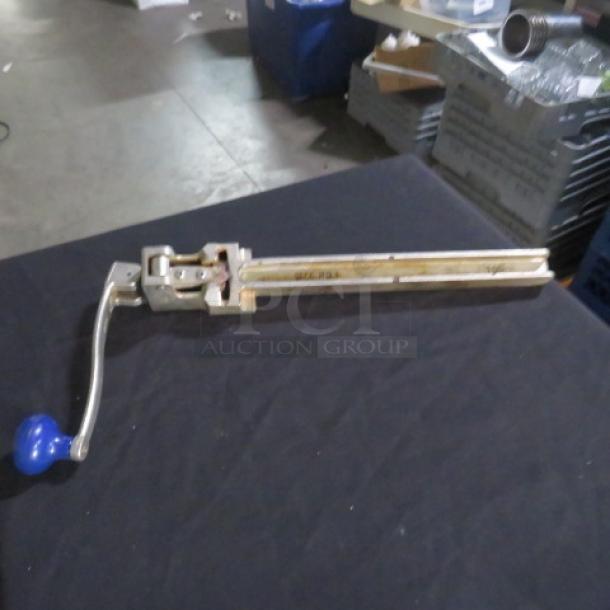 Edlund 10lb can opener with a blue handle, long lever arm, and visible mounting hardware, in good used condition.