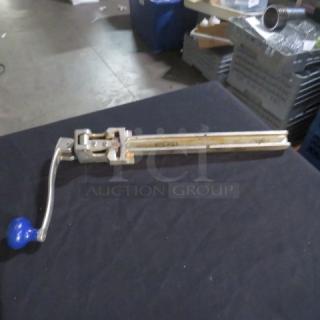 Edlund 10lb can opener with a blue handle, long lever arm, and visible mounting hardware, in good used condition.