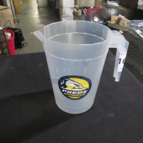 Clear plastic pitcher with handle, featuring Preds logo; used condition.