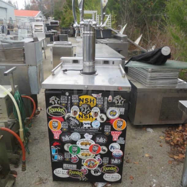 Micromatic MDD-23W kegorator, 1 door, dual zone, 115V, with 1 tower and 4 taps, 24x29x61 inches, sticker-covered front.