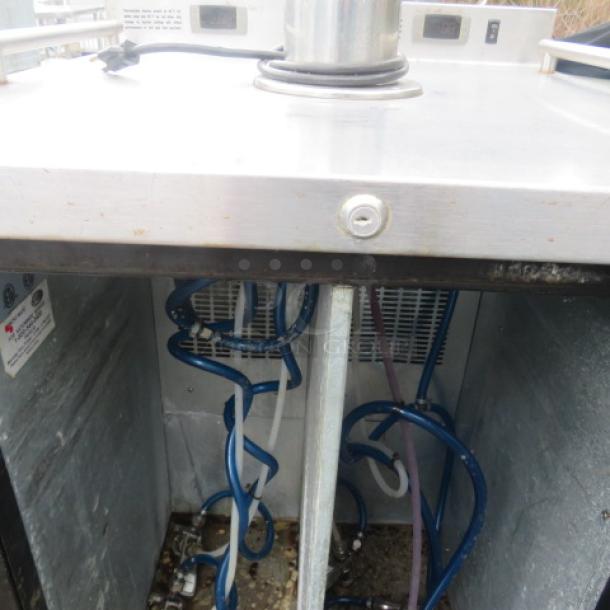 Micromatic kegorator, model MDD-23W, interior view. Features dual zone, 1 tower, 4 taps, 115V. Slight wear shown.