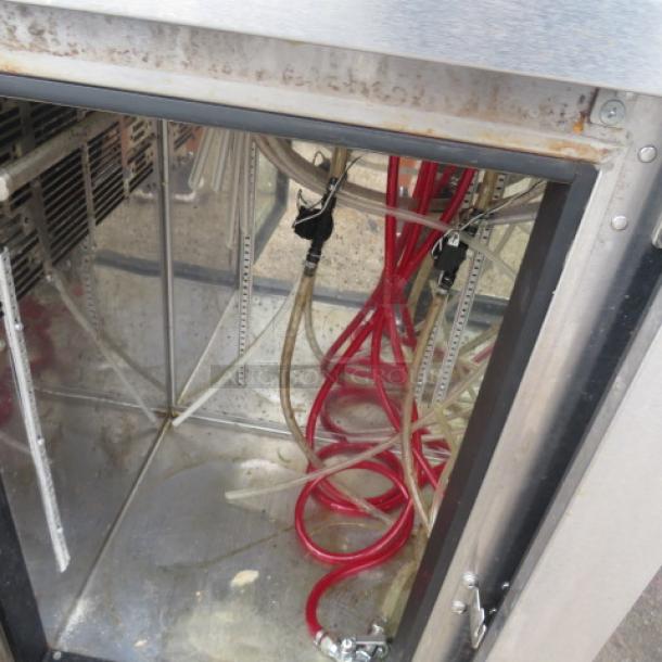 Perlick glass door kegorator with 6-tap tower, model BBSN-72-RO-1. Features include casters, cords, and interior storage.