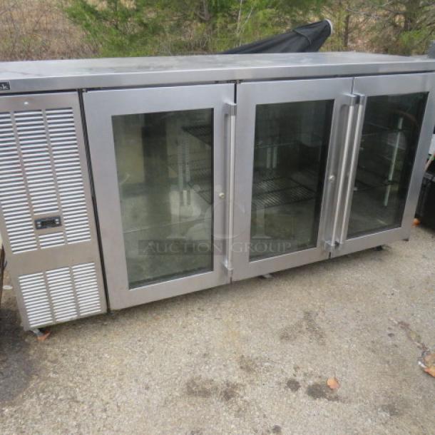 Perlick glass door refrigerated 3-door back bar cooler, model BBSN-72-RO-1, with 2 racks on casters, 72x25x38 inches.