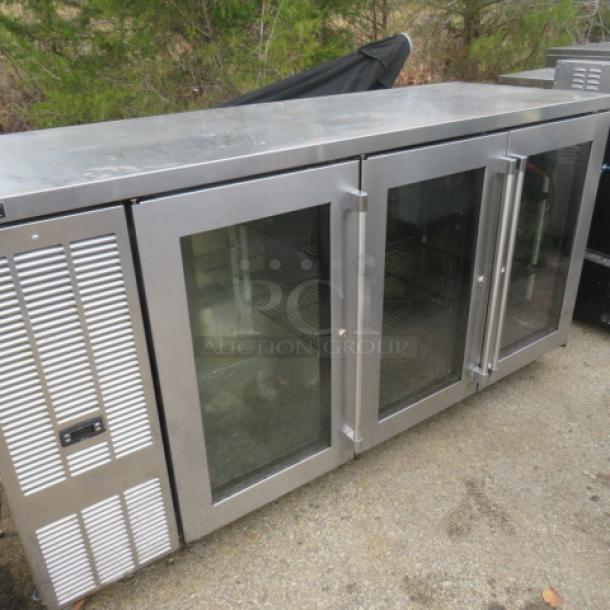 Perlick glass door 3-door back bar cooler, Model BBSN-72-RO-1, with two racks and casters, 72x25x38 inches, 115V.