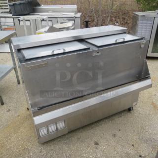 Perlick bottle box with bottle rail, model BC48, on casters, stainless steel, 48x24x38 inches, 115V, excellent condition.
