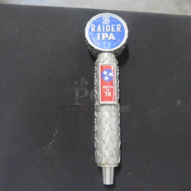 "One Beer Tap Handle for Raider IPA, metal with blue round top, diamond pattern grip, 'Crafted in TN' label, excellent condition."