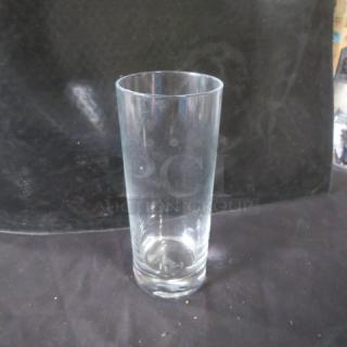 Clear tall bar glass, model 12XBID, in excellent condition, no visible scratches or chips. Perfect for serving beverages.