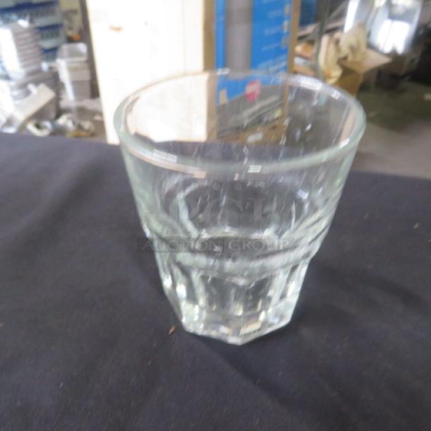 Clear glass rocks glass, 12XBID model, faceted design, used condition, no visible chips or cracks.