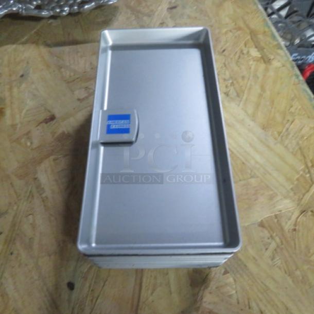 Lot of 8 American Express check holders, silver color, stacked view. Features logo on top. Suitable for commercial use.