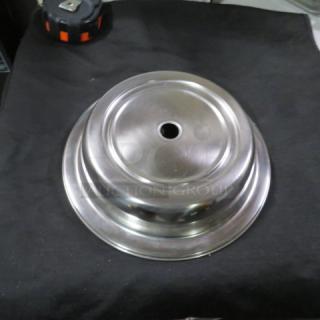 10.5-inch stainless steel plate cover, polished finish, centered vent hole, model 10XBID, excellent condition.